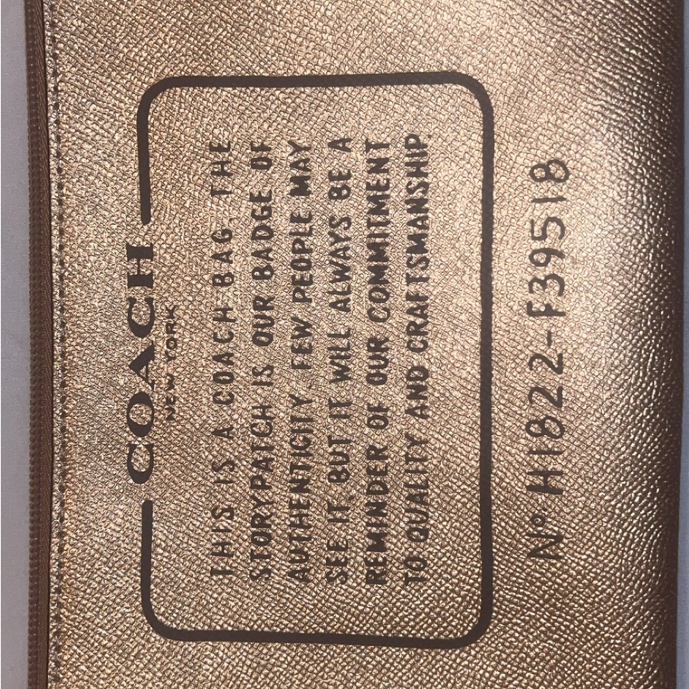 Coach story patch rose gold leather pouch/clutch